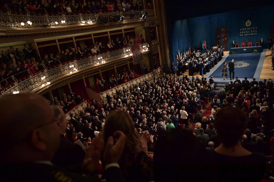 Spain's Kings Felipe VI and Letizia, top center, arrive at a ceremony of Princess Asturias Award in Oviedo, northern Spain, Friday Oct. 19, 2018. (AP Photo/Alvaro Barrientos)