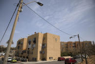 Older apartments are inhabited by Arabs in the Jaffa neighborhood of Tel Aviv, Israel, Wednesday, April 21, 2021. Historic Jaffa's rapid gentrification in recent years is coming at the expense of its mostly Arab lower class. With housing prices out of reach, discontent over the city’s rapid transformation into a bastion for Israel’s ultra-wealthy is reaching a boiling point. (AP Photo/Sebastian Scheiner)