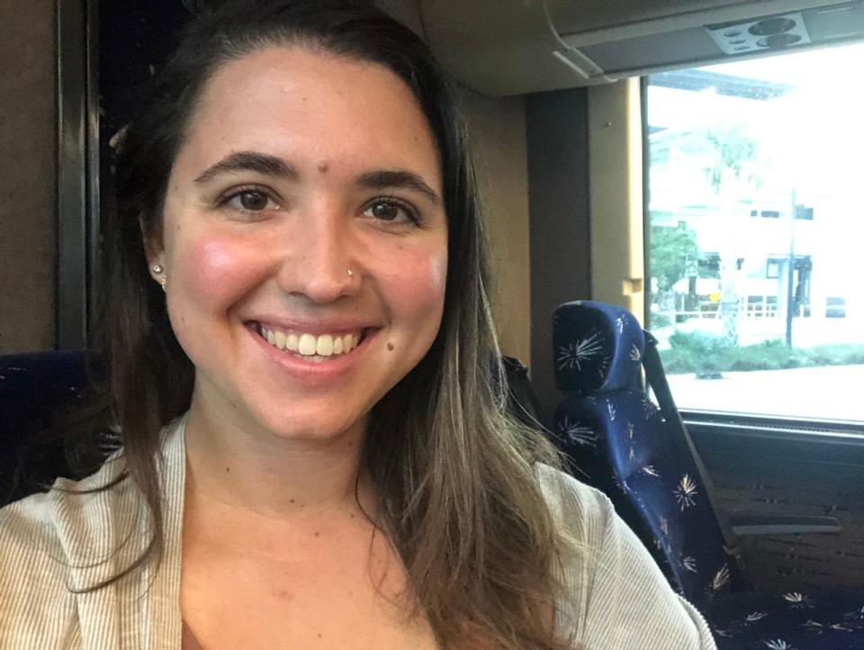 Author India Amos on bus