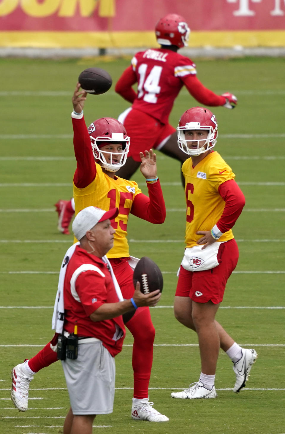 Kansas City Chiefs quarterback Patrick Mahomes (15) passes the ball during drills at the team's NFL football training camp Saturday, July 31, 2021 in St. Joseph, Mo. (AP Photo/Ed Zurga)