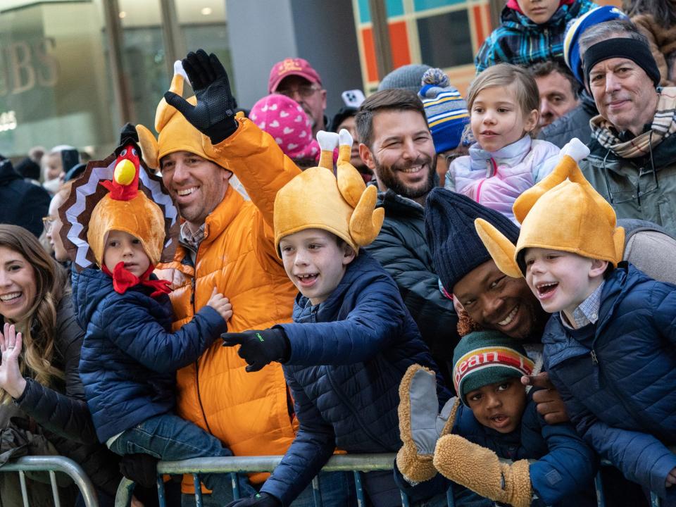 Spectators watch the parade.