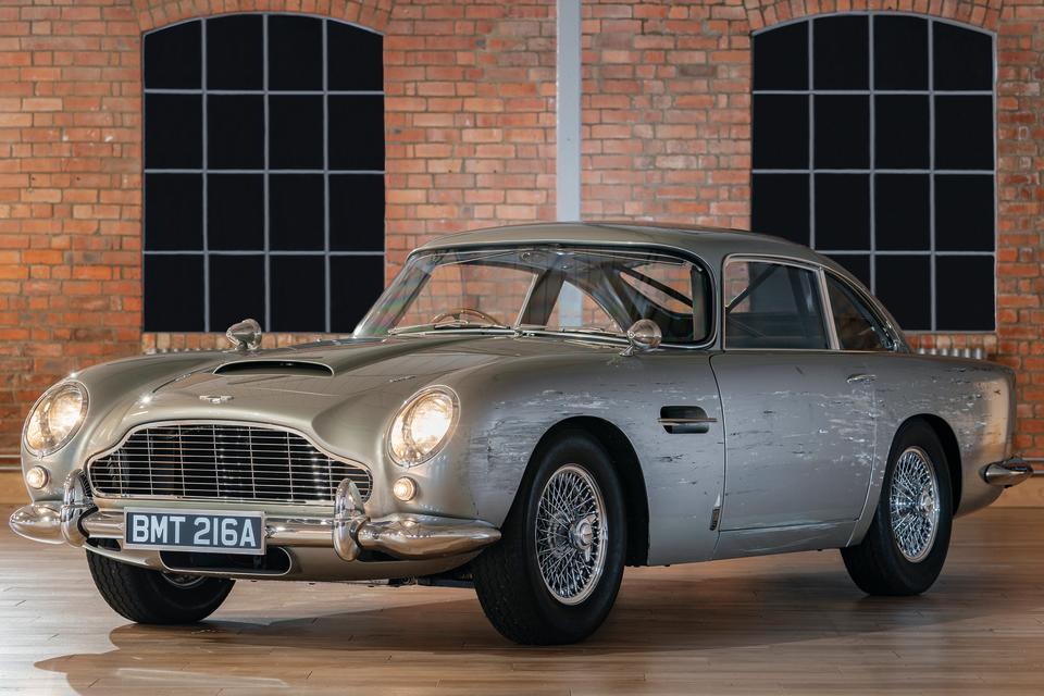 Among the top lots sold were a replica Aston Martin DB5 stunt car from the franchise’s latest offering No Time To Die (Max Earey/Christie’s Images/PA)