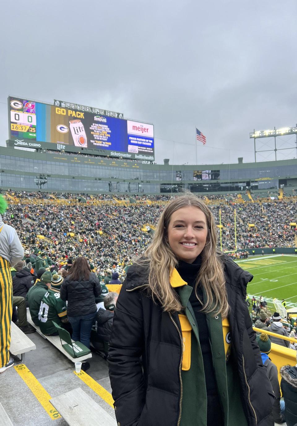 Grace Girard, a huge Wisconsin sports fan, is seen at Lambeau Field for a Green Bay Packers game. The Wisconsinite is a dating contestant on Fox's "Farmer Wants a Wife."