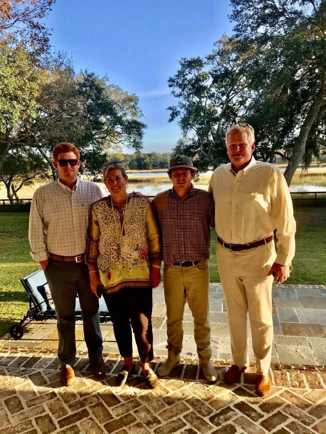 The Murdaugh family Buster, Maggie, Paul, and Alex (from left to right) pose for a photo .