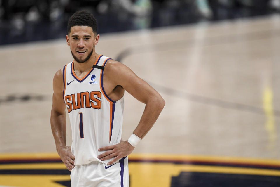 The Suns have Devin Booker's load management mapped to a tee. (AAron Ontiveroz/MediaNews Group/The Denver Post via Getty Images)