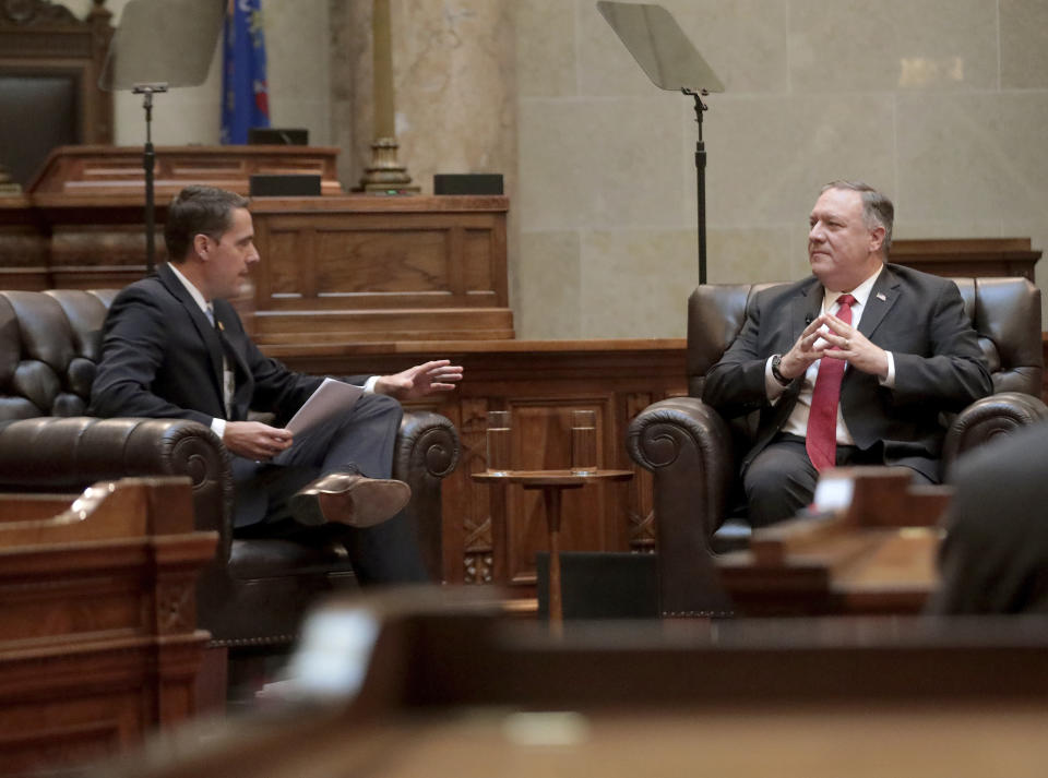 Secretary of State Mike Pompeo , right, listens to a question from Wisconsin Senate President Roger Roth, R-Appleton, during a question and answer sessions with state Republican legislators in the Senate chamber of the Wisconsin State Capitol in Madison, Wis. Wednesday, Sept. 23, 2020. (John Hart/Wisconsin State Journal via AP)