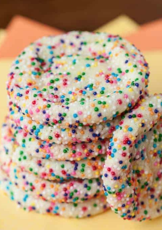 <p>Self-Proclaimed Foodie</p><p>Birthday sugar cookies are the softest homemade sugar cookies covered in fun sprinkles that taste like a perfect birthday cake!</p><p><strong>Get the recipe: <a href="https://selfproclaimedfoodie.com/birthday-cake-sugar-cookies/" rel="nofollow noopener" target="_blank" data-ylk="slk:Birthday Cake Sugar Cookies;elm:context_link;itc:0;sec:content-canvas" class="link rapid-noclick-resp"><em>Birthday Cake Sugar Cookies</em></a></strong></p>