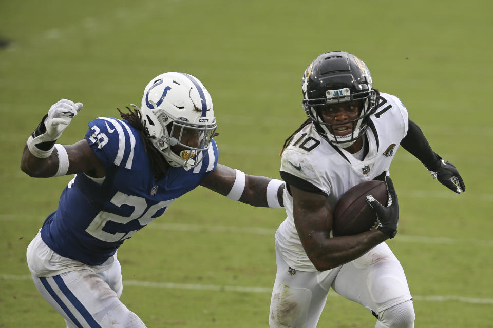 Jacksonville Jaguars wide receiver Laviska Shenault Jr. (10) runs past Indianapolis Colts free safety Malik Hooker, left, during the first half of an NFL football game, Sunday, Sept. 13, 2020, in Jacksonville, Fla. (AP Photo/Stephen B. Morton)