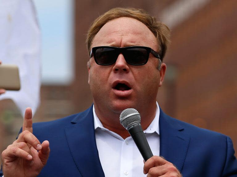 Conspiracy theorist Alex Jones blames ‘psychosis’ and Hillary Clinton for his Sandy Hook school shooting claims