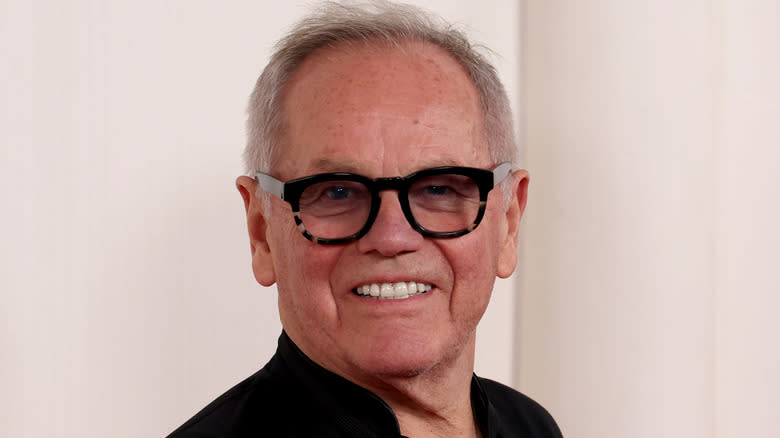 Wolfgang Puck grinning in glasses