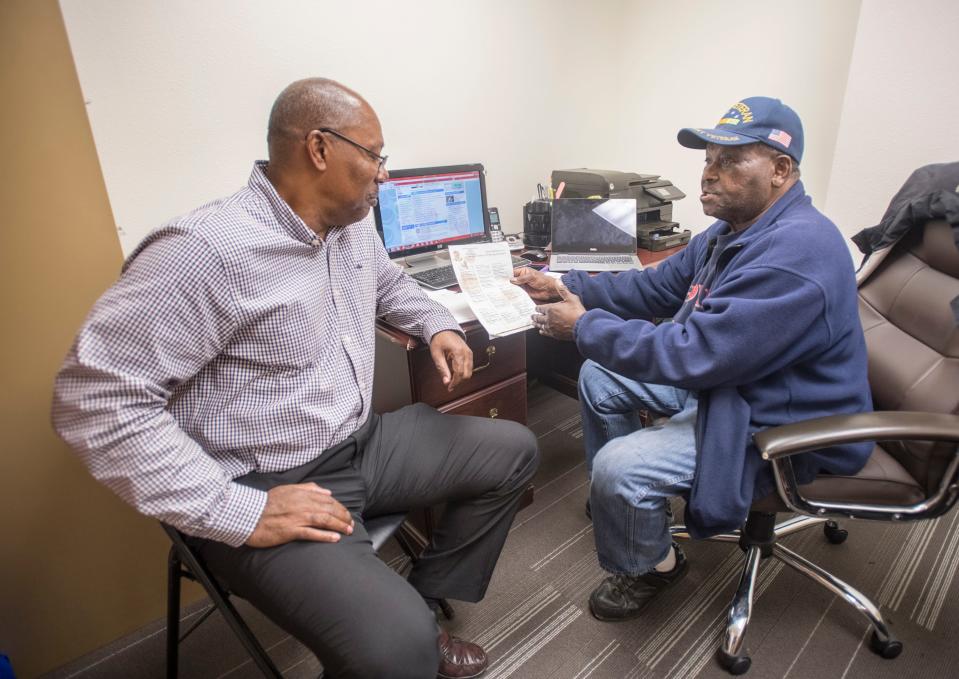 Gary Reynolds, left, and Walter Wallace, Sr. work in the Sickle Cell Disease Association office in downtown Pensacola on Monday, March 4, 2019.