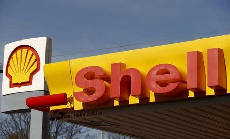 Shell's company logo is pictured at a gas station in Zurich April 8, 2015. BG Group's bonds traded up strongly on Wednesday on the back of Royal Dutch Shell's US$70bn offer to buy the UK firm. REUTERS/Arnd Wiegmann