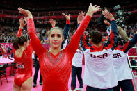 Alexandra Raisman of the United States celebrates during the final rotation in the Artistic Gymnastics Women's Team final on Day 4 of the London 2012 Olympic Games at North Greenwich Arena on July 31, 2012 in London, England. (Photo by Ronald Martinez/Getty Images)