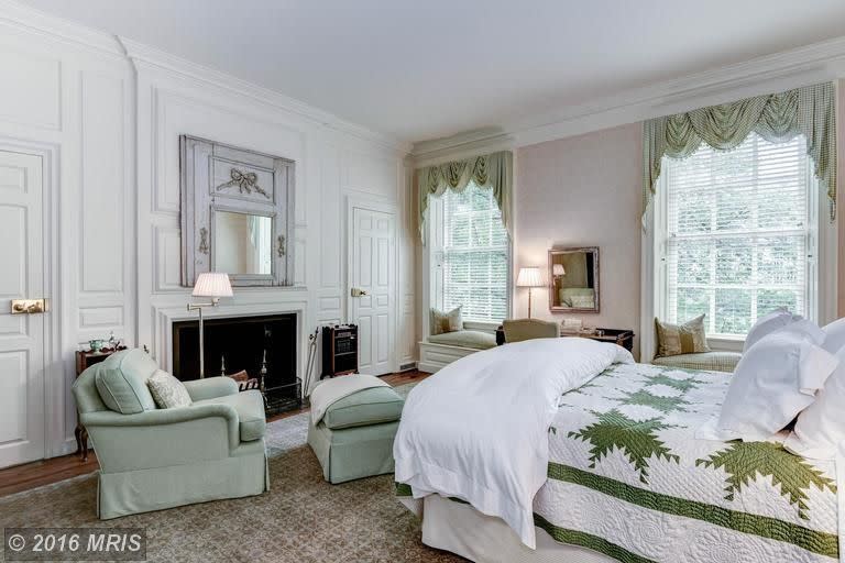 Bedroom with fireplace