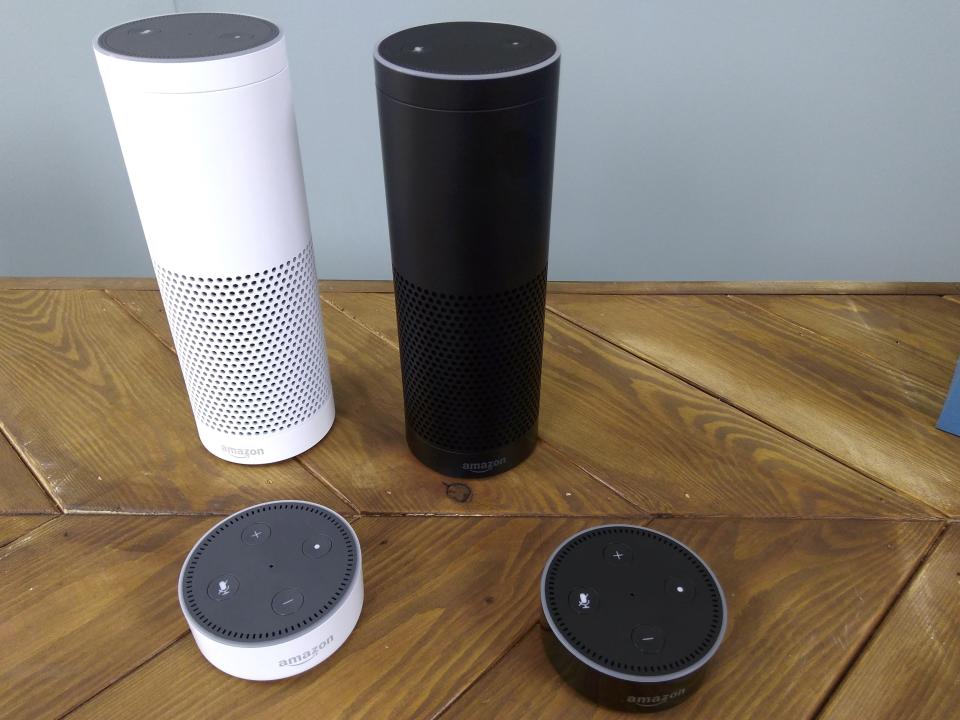 Amazon Echos and Echo Dots on a table. (Reuters)