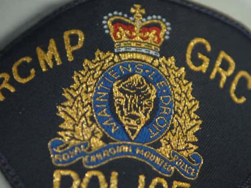 RCMP say a man was found dead in a vehicle Tuesday evening in a parking lot along Highway 7 in East Preston. Police say they are treating the death as a homicide. (CBC - image credit)