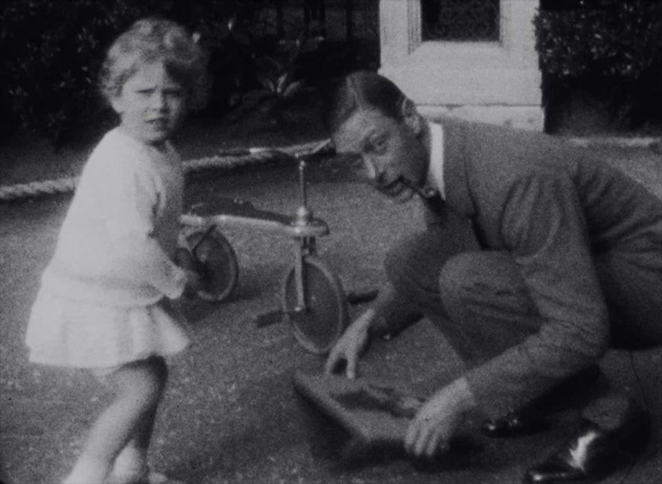 Emabargoed to 2200 May 26 2022. Princess Elizabeth and her father then The Duke of York in the garden of their home at 145 Piccadilly 1930 (BBC/PA)