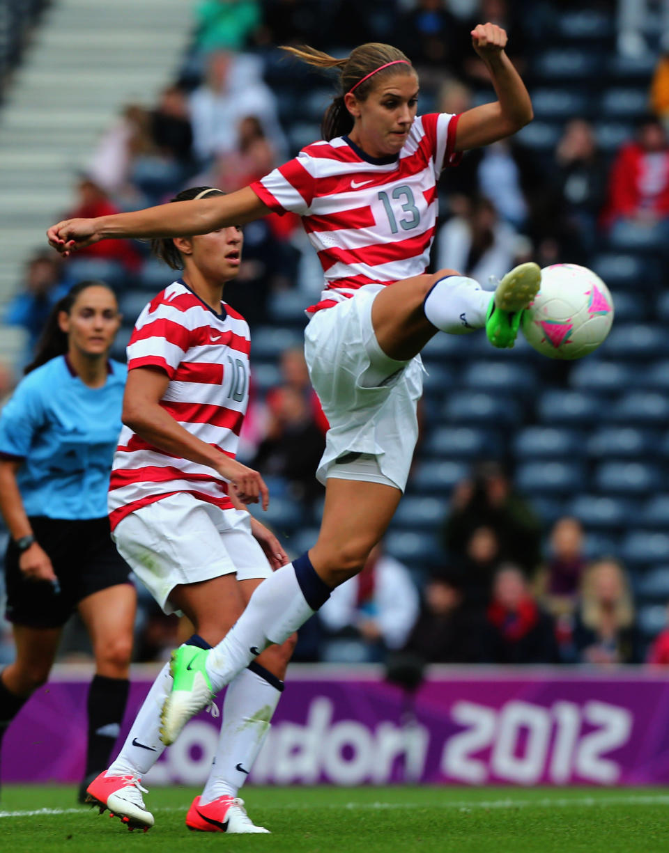 GLASGOW, SCOTLAND - JULY 28: Alex Morgan of USA strikes the ball during the Women's Football first round Group G match between United States and Colombia on Day 1 of the London 2012 Olympic Games at Hampden Park on July 28, 2012 in Glasgow, Scotland. (Photo by Stanley Chou/Getty Images)