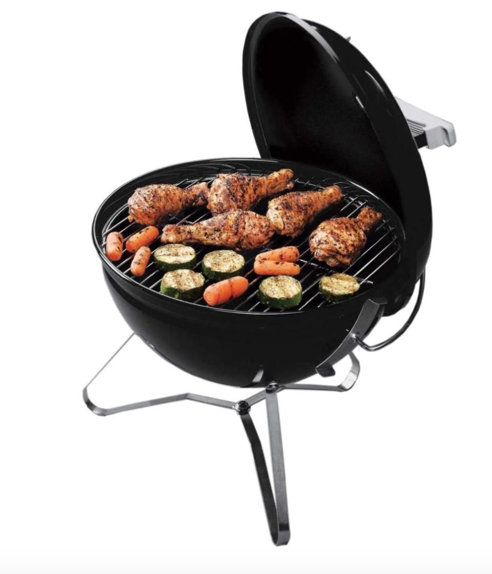 In a tight space? This miniature grill has an adjustable aluminum top that isn't supposed to rust and plated steel cooking grates that can handle just about anything you throw on them. <br /><br /><strong><a href="https://go.skimresources.com?id=38395X987171&amp;xs=1&amp;xcust=portablegrills-KristenAiken-061121-&amp;url=https%3A%2F%2Fwww.bbqguys.com%2Fweber%2Fsmokey-joe-premium-14-inch-portable-charcoal-grill-black%3Firclickid%3DzlAV9VUedxyLTodwUx0Mo37mUkBwvswXP2eB0s0%26utm_source%3Dimpact%26utm_medium%3Dcpa%26utm_species%3Daffiliate%26utm_partner%3D10078%26irgwc%3D1" target="_blank" rel="noopener noreferrer">Find it for $47.99 at BBQ Guys</a></strong>.