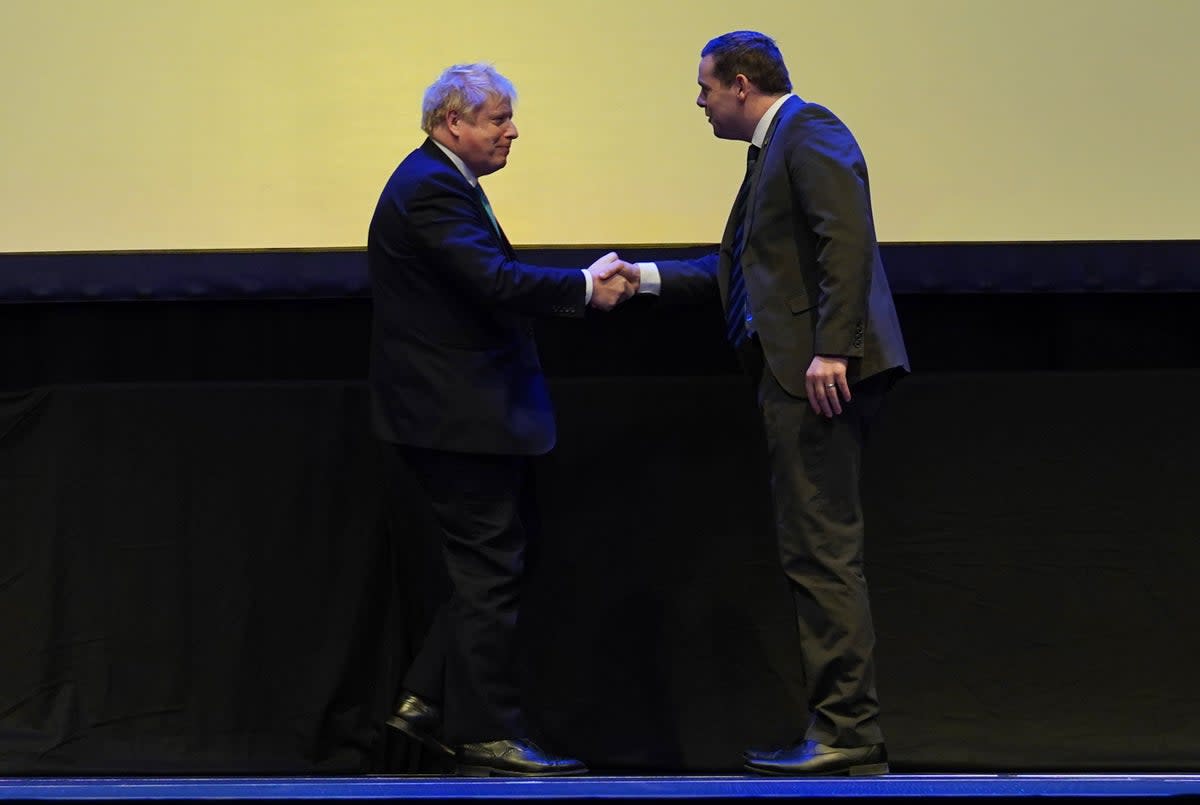 Prime Minister Boris Johnson, left, with Scottish Conservative leader Douglas Ross (PA) (PA Wire)