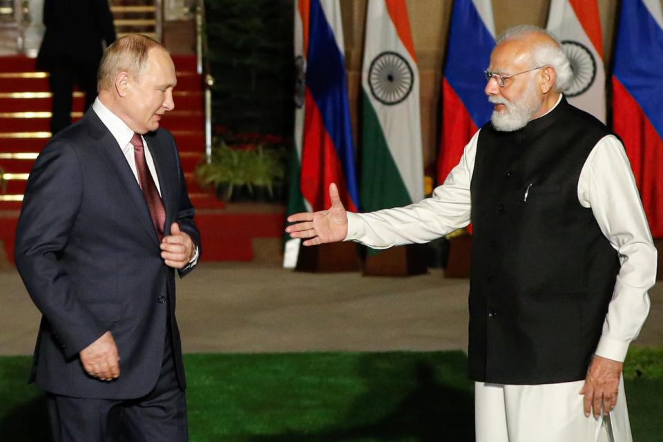 India's Prime Minister Narendra Modi welcomes Russia's President Vladimir Putin ahead of their meeting at Hyderabad House in New Delhi, India, in this file photo from Dec. 6, 2021. India has attempted to stay neutral when it comes to Russia's invasion of Ukraine. 