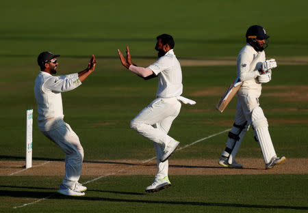 Cricket - England v India - Fourth Test - Ageas Bowl, West End, Britain - September 1, 2018 India's Mohammed Shami celebrates taking the wicket of England's Adil Rashid Action Images via Reuters/Paul Childs