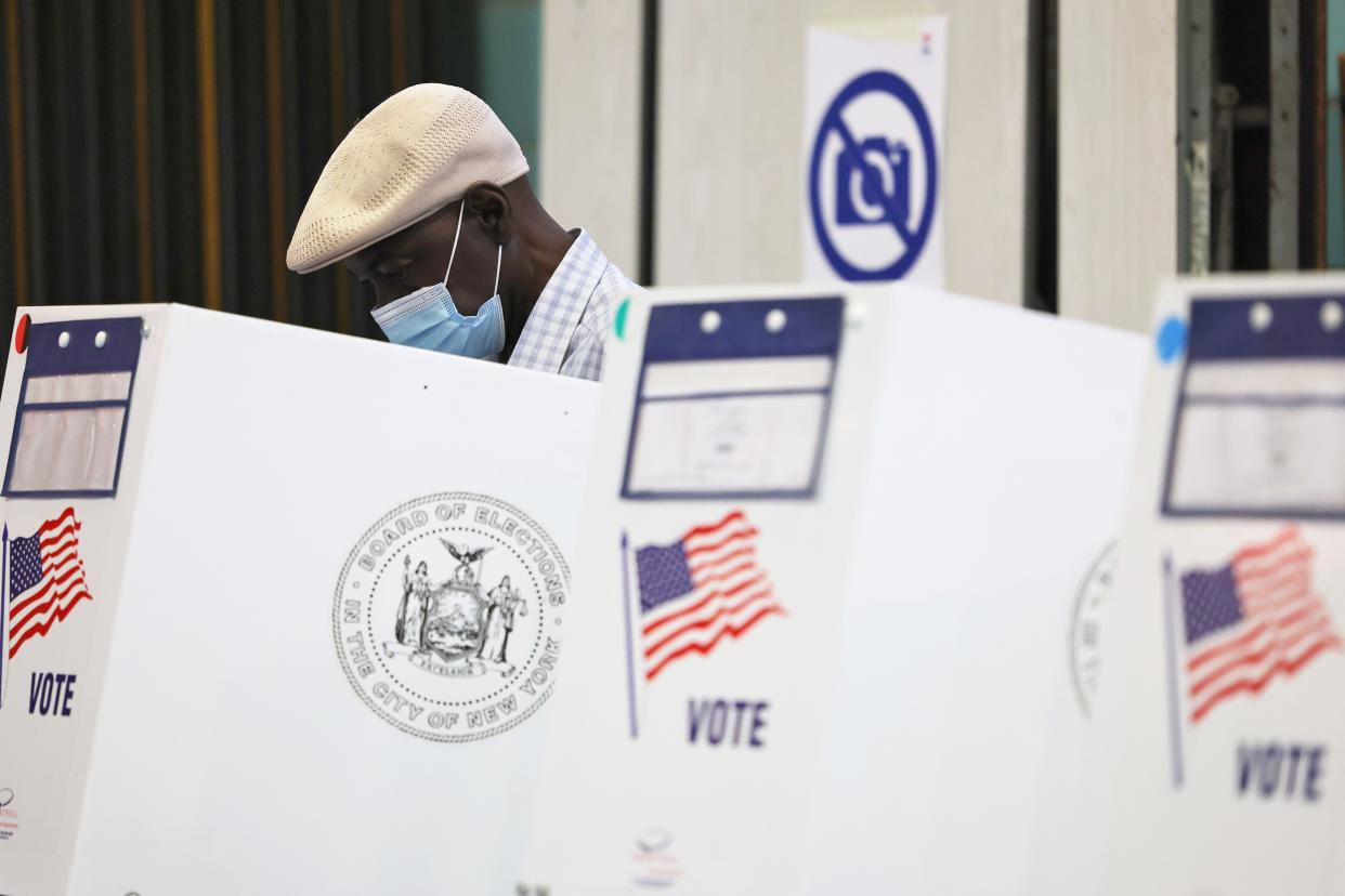 People vote during the Primary Election Day at Public School 81 in the Bedford-Stuyvesant neighborhood of Brooklyn, New York.