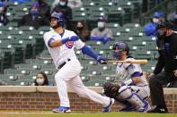 Chicago Cubs' David Bote hits a three run double against the Los Angeles Dodgers during the first inning of the first baseball game of a doubleheader Tuesday, May, 4, 2021, in Chicago. (AP Photo/David Banks)