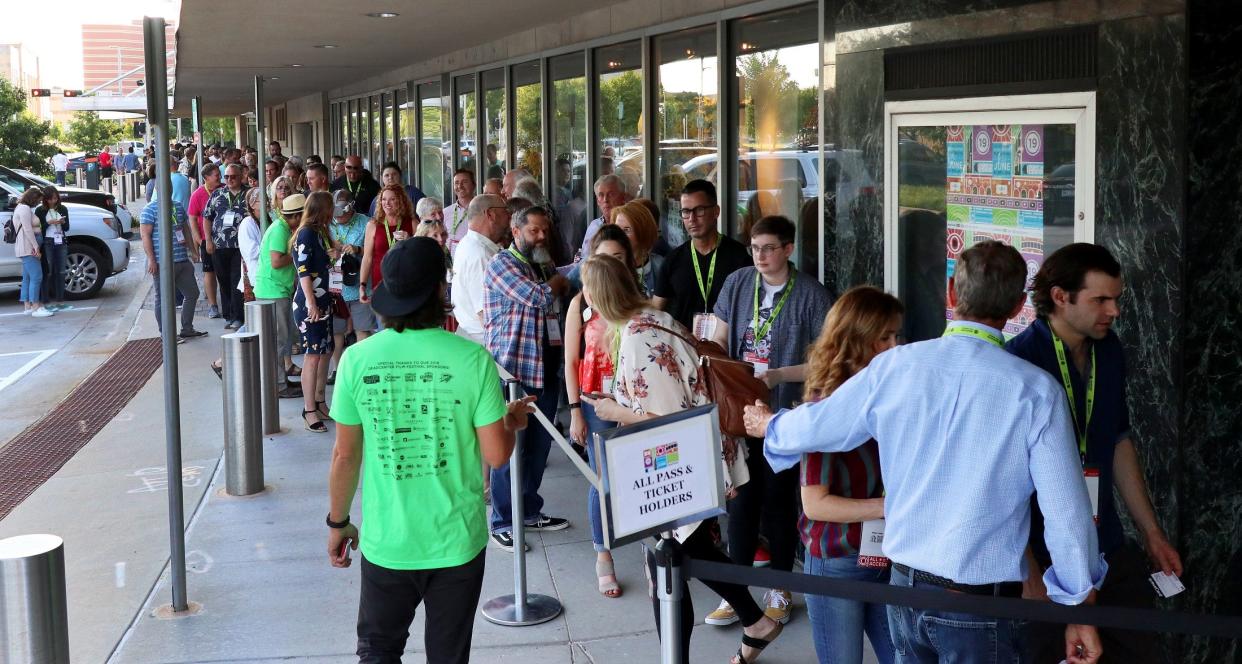 People wait in line for the screening of "Red Dog" at Oklahoma City Museum of Art during deadCenter Film Festival, Friday, June 7, 2019.