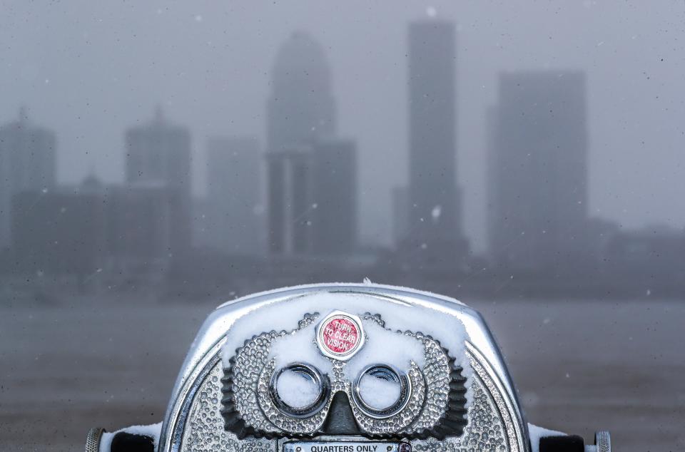 Turning the dial wouldn't help clear the view of Louisville as snow fell Thursday. January 6, 2022.