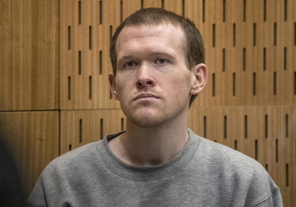 FILE - Australian Brenton Harrison Tarrant sits in the dock on the final day of his sentencing hearing at the Christchurch High Court after pleading guilty to 51 counts of murder, 40 counts of attempted murder and one count of terrorism in Christchurch, New Zealand, Aug. 27, 2020. An inquiry that began Tuesday, Oct. 24, 2023 into New Zealand’s worst mass-shooting will examine, among other issues, the response times of police and medics and whether any of the 51 people who were killed could have been saved. (John Kirk-Anderson/Pool Photo via AP, File)