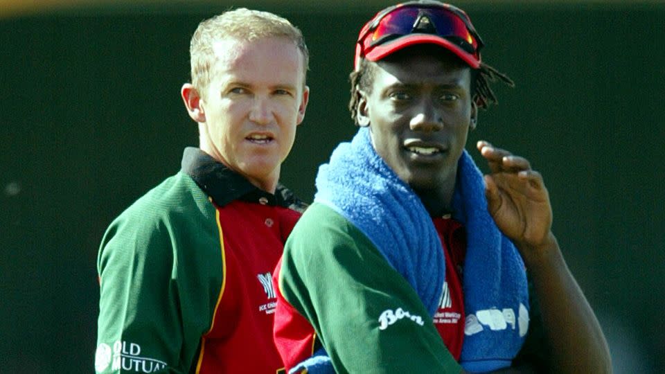 Flower (left) and Olonga were both exiled from Zimbabwe following their Cricket World Cup protest. - Howard Burditt/WS/Reuters