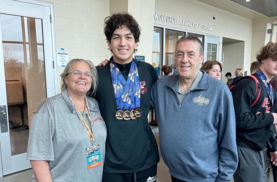Chenango Valley's Amir Sadykov, center, was a top-10 finisher in the 100-yard backstroke and 50 freestyle at the New York State Boys Swimming & Diving Championships on March 2, 2024 at Ithaca College.