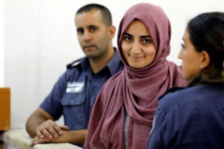 FILE PHOTO: Turkish citizen, Ebru Ozkan, who was arrested at an Israeli airport last month, being brought to an Israeli military court near Migdal, Israel July 8, 2018 REUTERS/Nir Elias