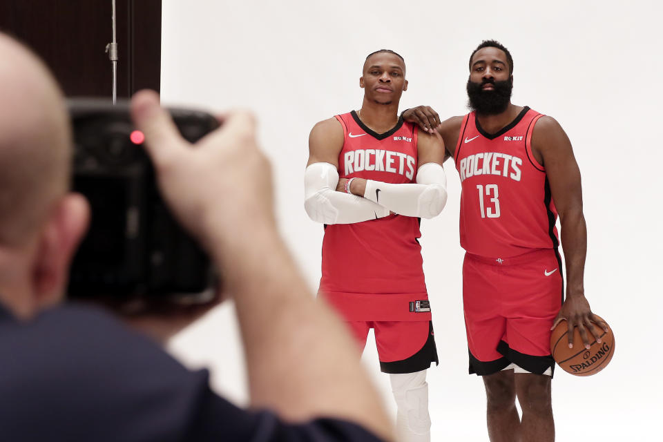 Houston Rockets' Russell Westbrook and James Harden, right, are photographed together during NBA basketball media day Friday, Sept. 27, 2019, in Houston. (AP Photo/Michael Wyke)