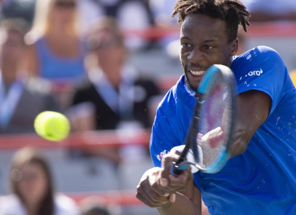 Gael Monfils, of France, returns to Roberto Bautista Agut, of Spain, during the Rogers Cup men’s tennis tournament Saturday Aug. 10, 2019, in Montreal.(Paul Chiasson/The Canadian Press via AP)