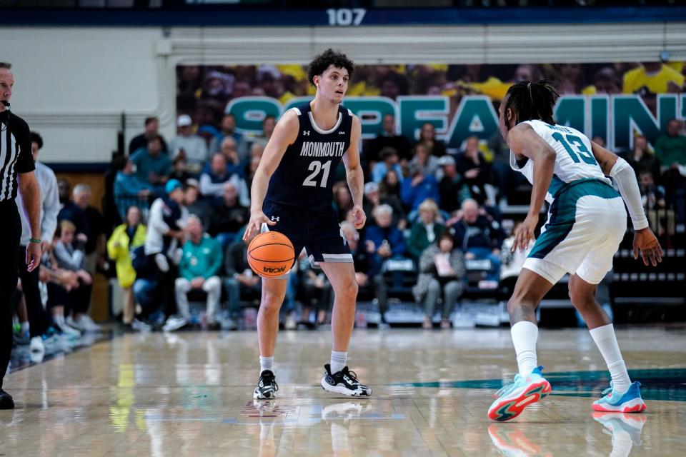 Monmouth guard Xander Rice looks for an opening against UNC Wilmington on Jan. 11, 2023 in Wilmington, N.C.