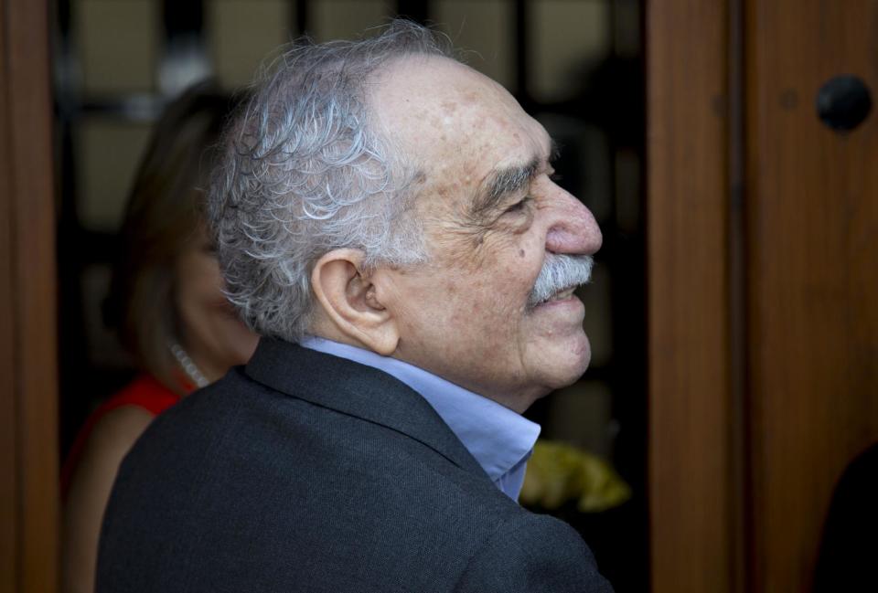 FILE - In this March 6, 2014, file photo, Colombian Nobel Literature laureate Gabriel Garcia Marquez greets fans and reporters outside his home on his birthday in Mexico City. Garcia Marquez, known as "Gabo" in Latin America, turned 87. Marquez has been hospitalized, Thursday April 3, 2014, at a local hospital in Mexico City. (AP Photo/Eduardo Verdugo, File)