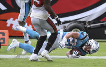 Carolina Panthers running back Christian McCaffrey (22) scores against the Tampa Bay Buccaneers during the second half of an NFL football game Sunday, Sept. 20, 2020, in Tampa, Fla. (AP Photo/Jason Behnken)