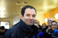 French former minister and candidate for the left-wing primaries, Benoit Hamon, poses at a polling station on January 22, 2017 in Trappes, southwest of Paris