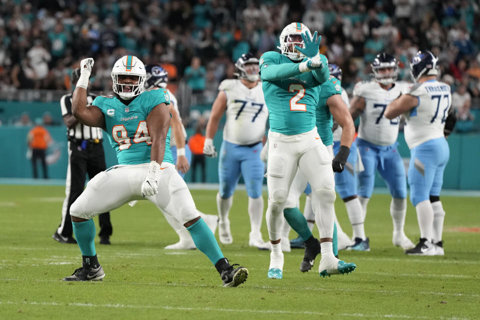 Miami Dolphins defensive tackle Christian Wilkins (94) celebrates after sacking Tennessee Titans quarterback Will Levis (8) during an NFL football game, Monday, Dec. 11, 2023, in Miami Gardens, Fla. (AP Photo/Doug Benc)