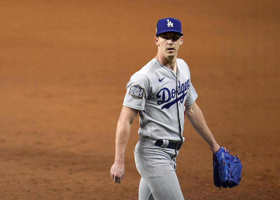 ARLINGTON, TX - OCTOBER 23: Walker Buehler #21 of the Los Angeles Dodgers walks off the field after the fourth inning of Game 3 of the 2020 World Series between the Los Angeles Dodgers and the Tampa Bay Rays at Globe Life Field on Friday, October 23, 2020 in Arlington, Texas. (Photo by Cooper Neill/MLB Photos via Getty Images)