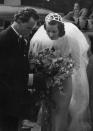 <p>When Swedish-born actress Ingrid Bergman wed Petter Lindström in 1937, the bride's simple crepe gown was of typical fashion for the decade. Her real showstopper? The caged juliet cap that she wore on top of her pin curls and veil. </p>