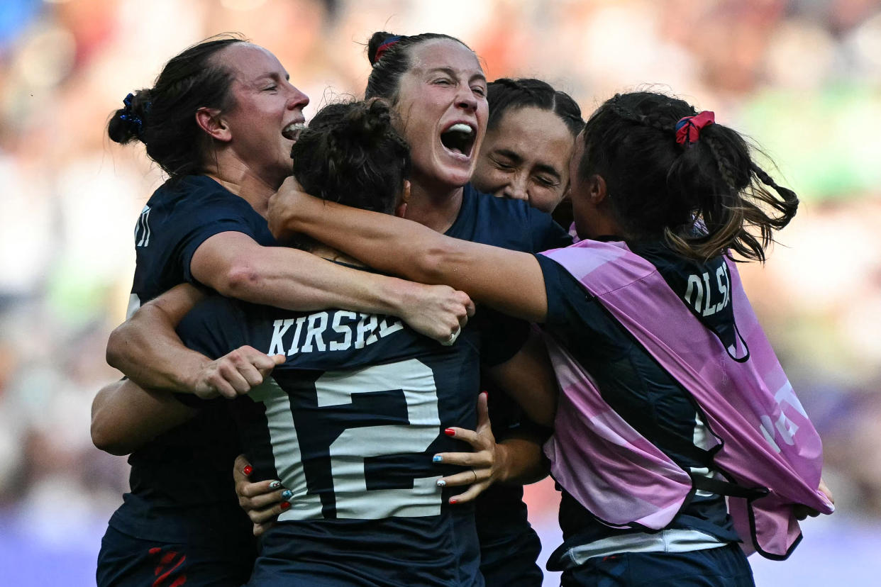 US' players react after the women's bronze medal rugby sevens match between USA and Australia during the Paris 2024 Olympic Games at the Stade de France in Saint-Denis on July 30, 2024. (Photo by CARL DE SOUZA / AFP) (Photo by CARL DE SOUZA/AFP via Getty Images)