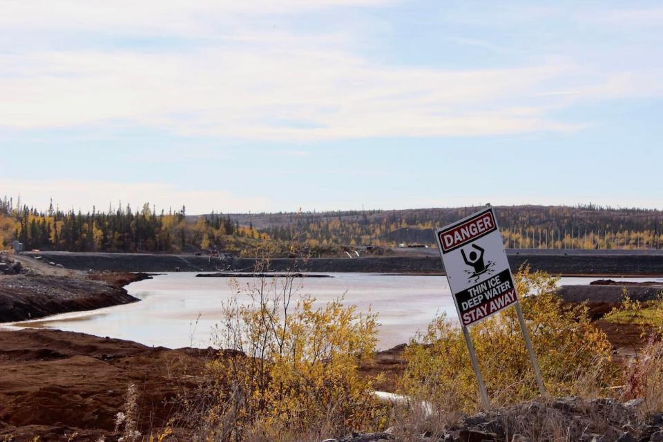A settling pond at the Giant Mine site on Sept. 21, 2022. Beyond it is a polishing pond. Both are parts of the process that treats contaminated ground water before it is released into Baker Creek, which flows in Yellowknife Bay.
