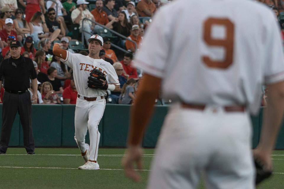 Texas third baseman Peyton Powell warms up between innings of a game against Texas Tech last year. "I want to win a natty," he said of choosing the Longhorns over pro ball.