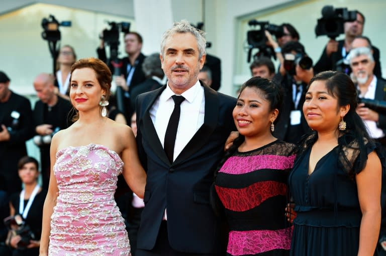 Cuaron with (from left) actresses Marina de Tavira, Yalitza Aparicio and Nancy Garcia from the film "Roma"