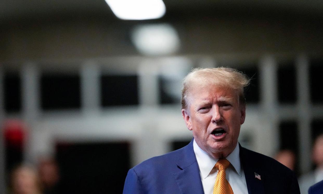 <span>Donald Trump speaks to members of the media at Manhattan criminal court, in New York on Tuesday.</span><span>Photograph: Mary Altaffer/Reuters</span>