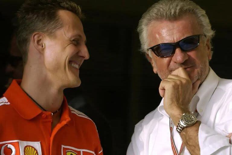 Michael Schumacher y su representante, Willi Weber