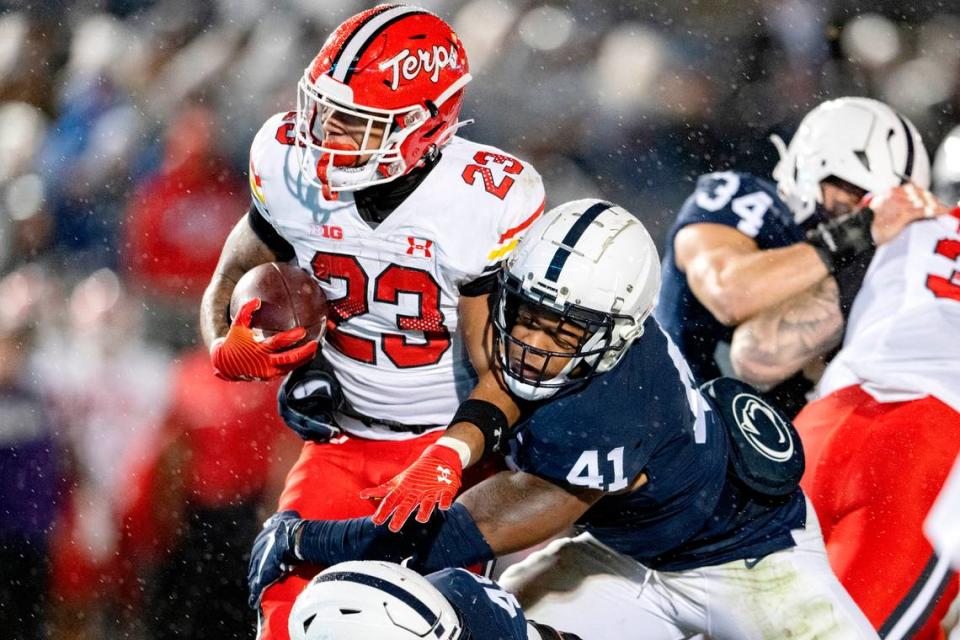 Penn State linebacker Kobe King stops Maryland’s Colby McDonald during the game on Saturday, Nov. 12, 2022.